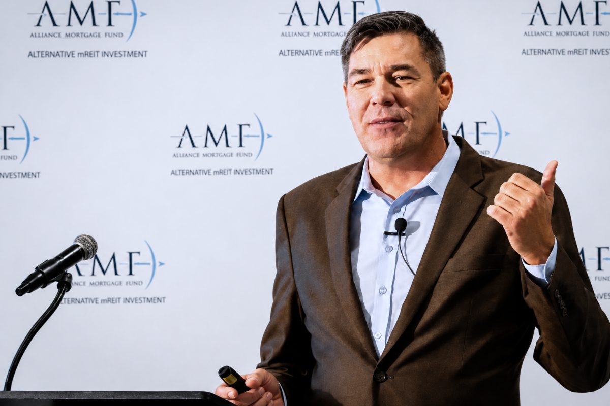 Dr. Thornberg speaking at an Alliance Mortgage Fund event